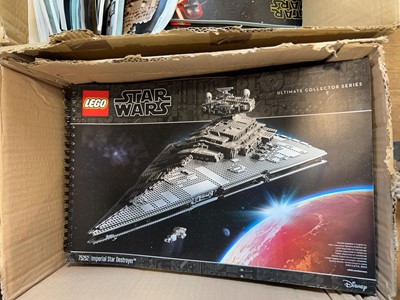 Lot 1072 - 4 boxes containing various Lego model manuals