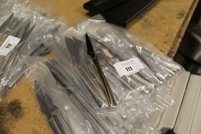 Lot 111 - Approximately 100 modern stainless steel steak...
