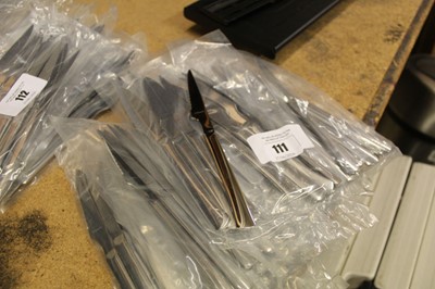 Lot 112 - Approximately 100 modern stainless steel steak...