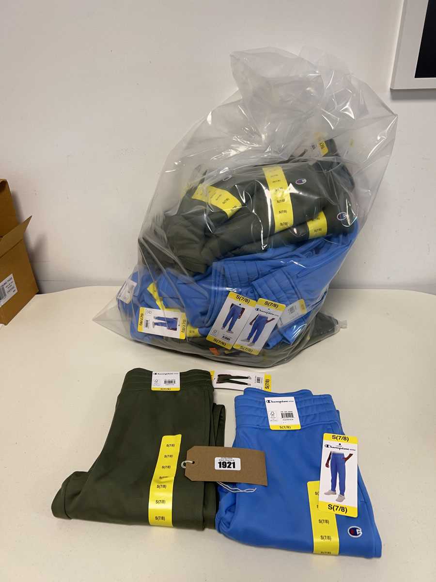Lot Approx. 20 pairs of kids joggers by Champion.