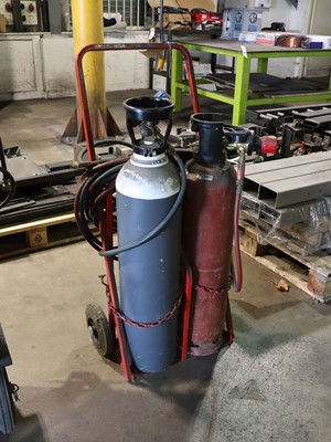 Lot 21 - Oxy-acetylene cutting torch set on trolley...