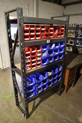 Lot 89 - Freestanding 4-tier rack with contents; nuts &...