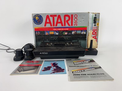 Lot 1 - A boxed Atari model CX-2600 AP video computer...
