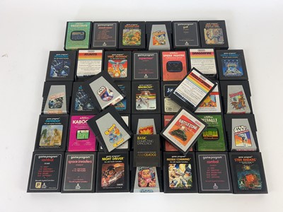 Lot 3 - A carton containing an assortment of Atari...