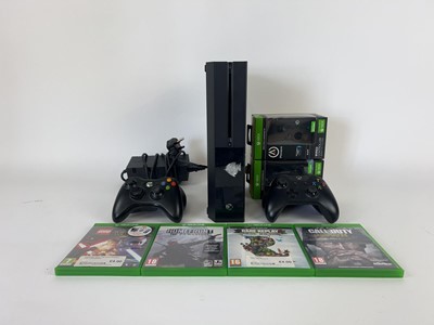 Lot 4 - An Xbox One model 1540 console with power...