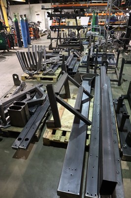 Lot 106 - 8 pallets of metal stock - mostly WIP, plus 2...