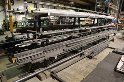 Lot 107 - Large floorstanding rack various tube, bar,...
