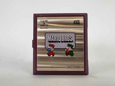 Lot 8 - A Nintendo Game and Watch multi screen video...