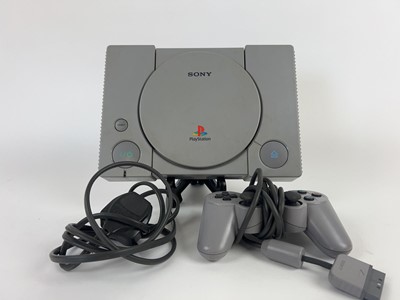 Lot 13 - A Sony model SCPH-7502 Playstation console...