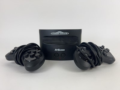 Lot 16 - An ATGames Sega Megadrive console with PSU,...
