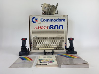 Lot 19 - A boxed Amiga model A600 Commodore console...