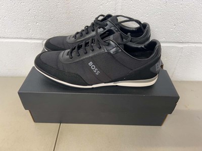 Lot Boxed pair of Hugo Boss trainers in black size...
