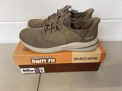 Lot Boxed pair of Skechers hands free swift fit...
