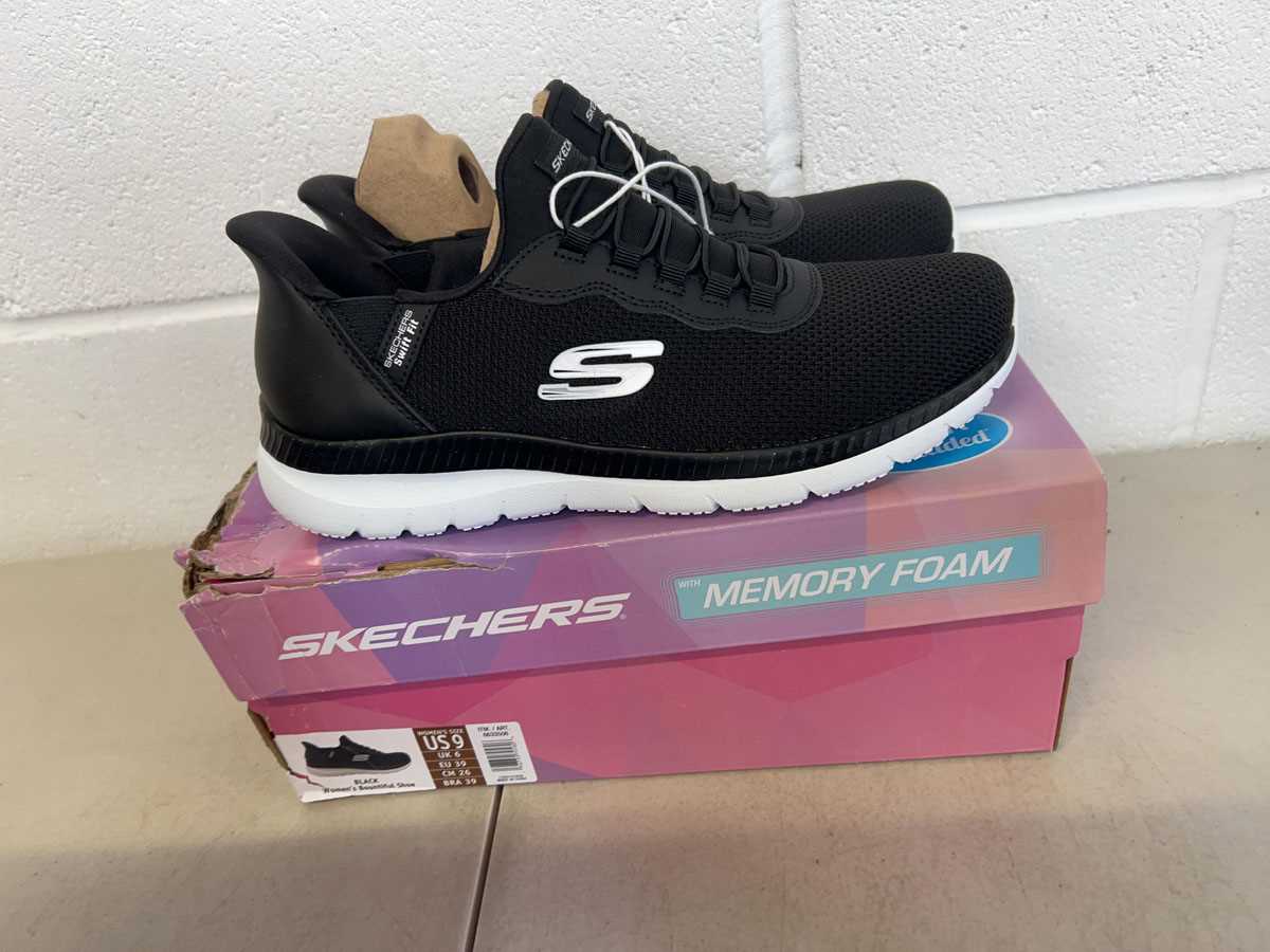 Lot Boxed pair of Skechers hands free swift fit...