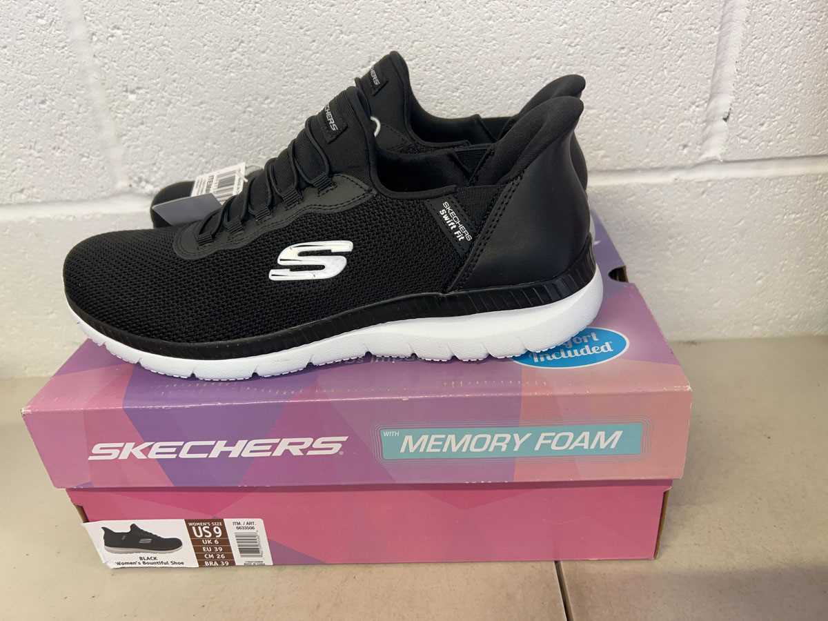 Lot Boxed pair of Skechers hands free swift fit...