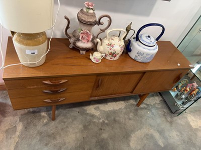 Lot 1301 - Mid century teak effect sideboard with 3 left...