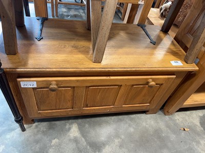 Lot 1323 - Honey oak storage box with false drawer and...