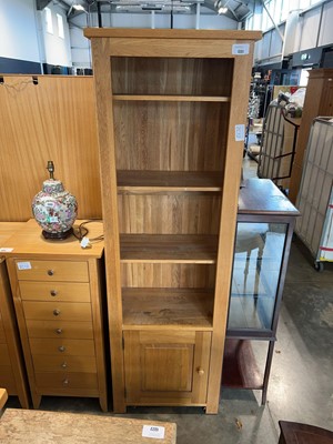 Lot 1331 - Honey oak open front storage unit with single...