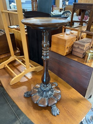 Lot 1348 - Turned mahogany plant stand on claw supports