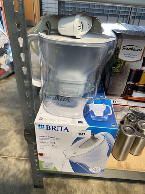 Lot 1147 - 3 boxed and 2 unboxed Brita water filter jugs