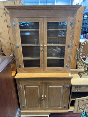 Lot 1386 - Limed oak glazed bookcase with lower cupboard...