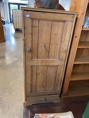 Lot 1396 - Early 20th Century pine single door cupboard...