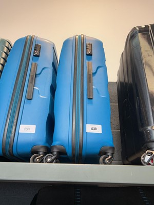 Lot 1230 - Blue American Tourister hard shell suitcase