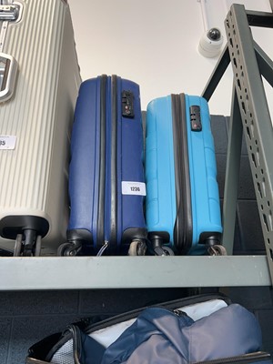 Lot 1236 - 2 small blue American Tourister suitcases