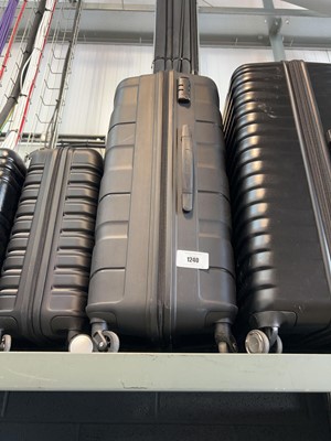 Lot 1240 - American Tourister hard shell suitcase in black