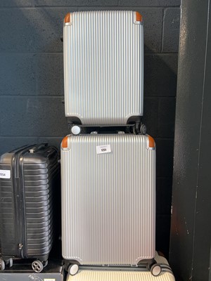 Lot 1251 - 2 Swiss Military suitcases in silver