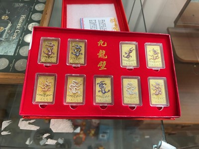 Lot 1005 - Commemorative 9 piece Chinese gold plated...
