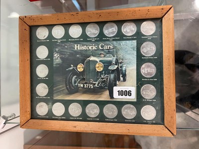 Lot 1006 - Framed historic cars collector's coin set