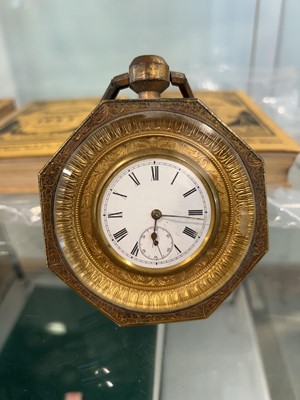 Lot 1027 - Free standing brass cased travel clock