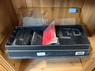 Lot 1028 - Letter printing set containing various moulds...