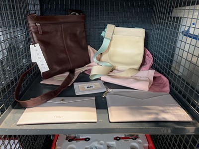 Lot 1045 - An assortment of Radley bags and purses, some...
