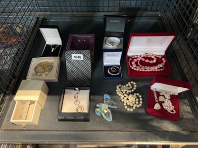 Lot 1046 - Cage containing a variety of jewellery, some...