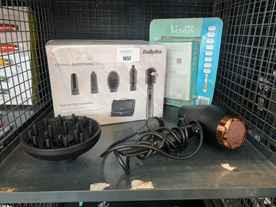 Lot 1057 - Babyliss hairdryer, together with a boxed...