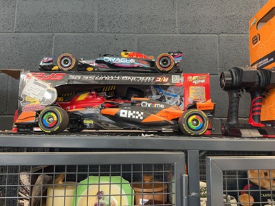 Lot 1066 - 3 boxed and further loose RC formula racing cars