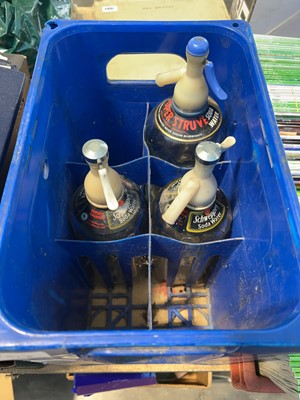 Lot 1078 - Blue crate containing 3 Schweppes soda bottles