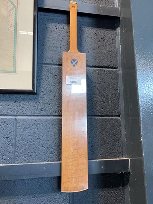 Lot 1495 - Plaque in the form of a cricket bat signed by...