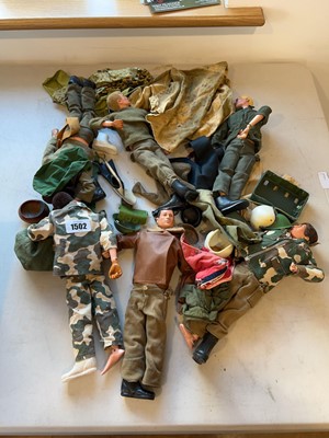 Lot 1502 - An assortment of action men with various...