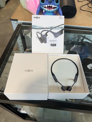 Lot 1580 - Boxed pair of Shokz Open Swim Pro bone...