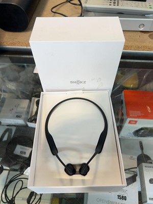 Lot 1591 - Boxed pair of Shokz bone conduction running...