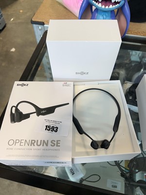 Lot 1593 - Boxed pair of Shokz Open Run SE bone...