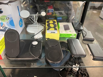 Lot 1599 - Half shelf of Belkin accessories incl. power...