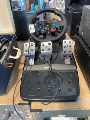 Lot 1544 - Gaming wheel and pedal set for Playstation