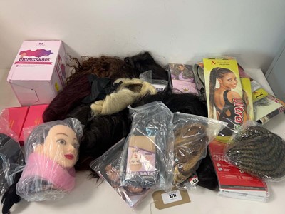 Lot 3711 - Mixed hair extensions, wigs and training heads