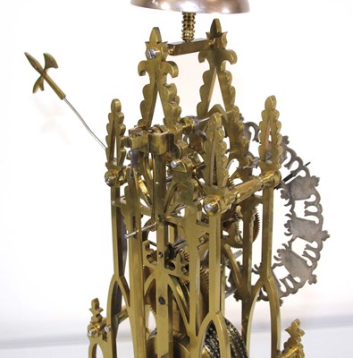 Lot 78 - A late 19th century brass skeleton clock...