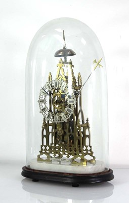 Lot 78 - A late 19th century brass skeleton clock...