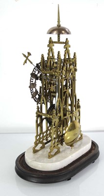 Lot 78 - A late 19th century brass skeleton clock...